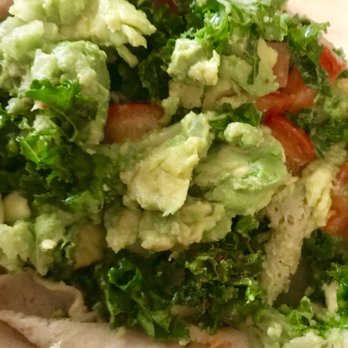 ALDI - a close up of a burrito with guacamole and tomatoes - Grocery Near Me - Memphis, Tennessee