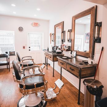 Nic Grooming Barber Shop Sansom St - An interior view of barber stations at Nic Grooming Barber Shop Sansom Street - Men's Hair Salons Near Me - Philadelphia, Pennsylvania Nic Grooming Barber Shop Sansom St - An interior view of barber stations at Nic Grooming Barber Shop Sansom Street - Men's Hair Salons Near Me - Philadelphia, Pennsylvania