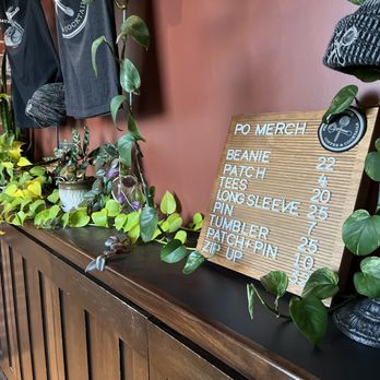 Principal's Office - plants and a sign - Cocktail Bars Near Me - Colorado Springs, Colorado