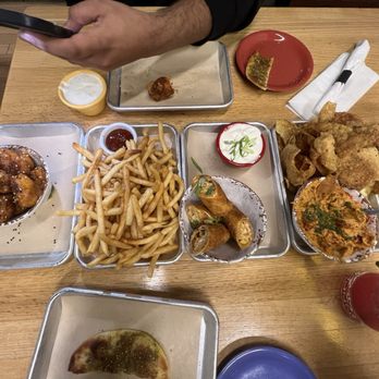 Avenue American Bistro - General Tso's cauliflower, fries, buffalo chicken egg rolls, chipotle hummus - Sports Bars Near Me - Wayne, Michigan Avenue American Bistro - General Tso's cauliflower, fries, buffalo chicken egg rolls, chipotle hummus - Sports Bars Near Me - Wayne, Michigan