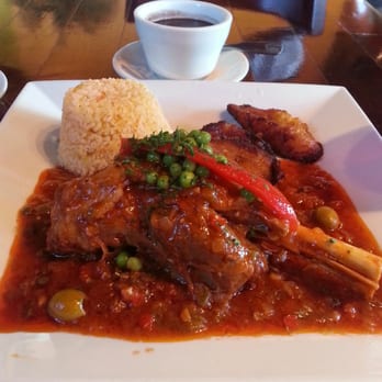 Mambo's Cafe - Chilindron de Cordero - Lamb shanks cooked in creole sauce. It has an amazing taste to it and is not spicy!   It's a must try! - Cuban Near Me - Alpharetta, Georgia