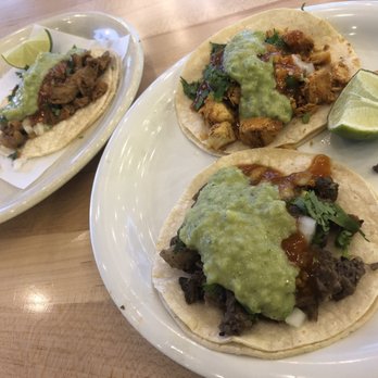 Tacos Chukis - Beef taco (front), chicken taco (middle), adobada taco (back left) - Tacos Near Me - Seattle, Washington Tacos Chukis - Beef taco (front), chicken taco (middle), adobada taco (back left) - Tacos Near Me - Seattle, Washington