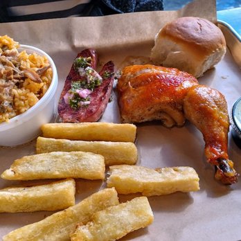 Lechón Latin BBQ & Bar - Carnitas rice, sausage, chicken, yucca fries - Latin American Near Me - Raleigh, North Carolina Lechón Latin BBQ & Bar - Carnitas rice, sausage, chicken, yucca fries - Latin American Near Me - Raleigh, North Carolina