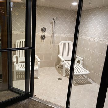 Sybaris Pool Suites - The real steam room with an old door that wouldn't really shut all the way. The tile was newer but- not as pictured on the website - Hotels Near Me - Indianapolis, Indiana