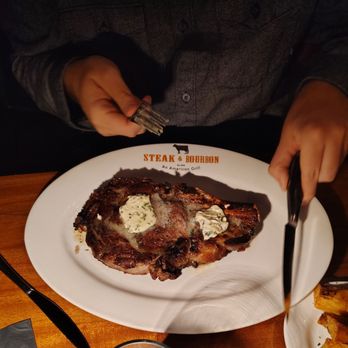 Steak & Bourbon - 28 oz cowboy ribeye - Steakhouses Near Me - Louisville, Kentucky Steak & Bourbon - 28 oz cowboy ribeye - Steakhouses Near Me - Louisville, Kentucky