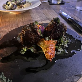 Beeside Balcony - Lamb, sauce dripping off the plate - Mediterranean Near Me - Del Mar, California