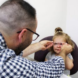 Rocky Mountain Optical and Vision Care - Pediatric patient receiving glasses