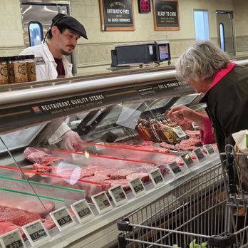 The Fresh Market - A customer asks the staff member for a particular meat. - Grocery Near Me - Roanoke, Virginia The Fresh Market - A customer asks the staff member for a particular meat. - Grocery Near Me - Roanoke, Virginia