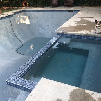 Ireland Pools - Starting to fill the pool after resurfacing and new tile. Paddington approves of the quality. - Pool Cleaners Near Me - Newbury Park, California Ireland Pools - Starting to fill the pool after resurfacing and new tile. Paddington approves of the quality. - Pool Cleaners Near Me - Newbury Park, California