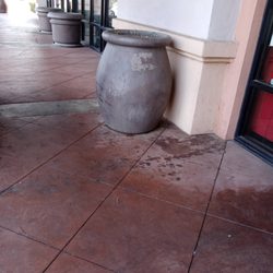 Outside entrance-trash and stains on cement