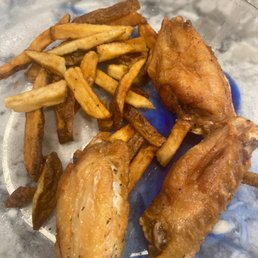 a plate of fried chicken and french fries a plate of fried chicken and french fries