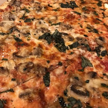 Mr Crispy's Brick Oven Pizza - a pizza with mushrooms and spinach - Pizza Near Me - Garnerville, New York Mr Crispy's Brick Oven Pizza - a pizza with mushrooms and spinach - Pizza Near Me - Garnerville, New York