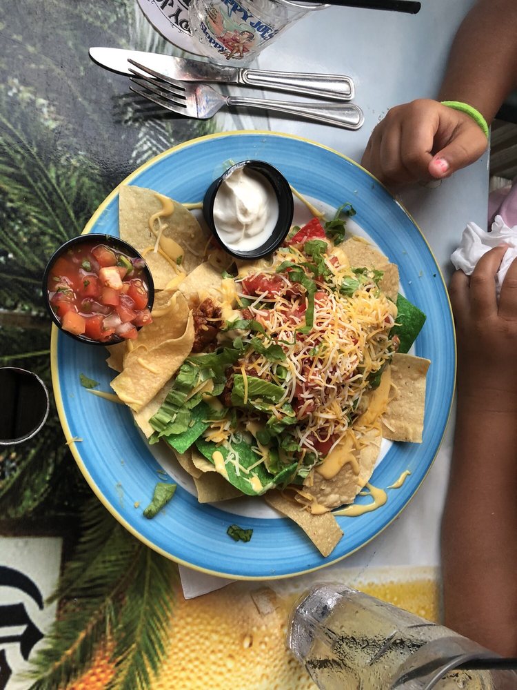 Order SLOPPY NACHOS food online from Sloppy Joe's on the Beach store, Treasure Island on bringmethat.com