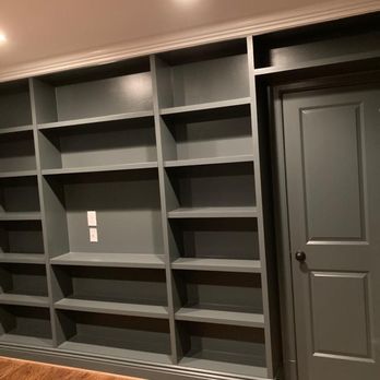 Molina Contractors - the finished built in bookcases - General Contractors Near Me