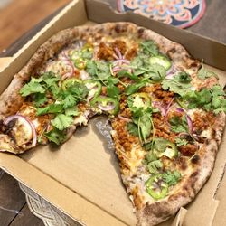 Cosecha Wood Fired Pizza - The seasonal Mexican pizza! Chorizo, black beans, jalapeños, onions, and cilantro! YUM