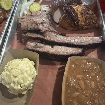 The Brisket House - Three meat plate: ribs, brisket, and chicken. - Barbeque Near Me - Houston, Texas