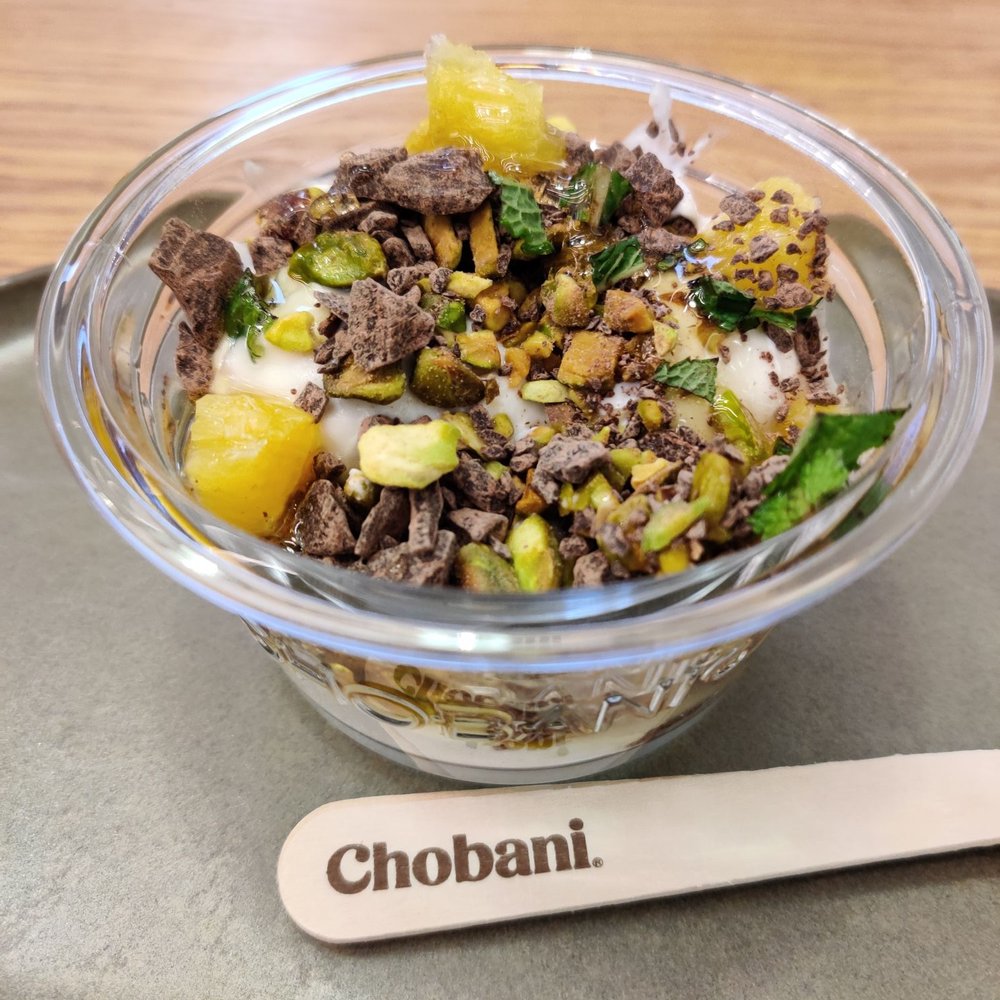 Chobani - Pistachio and Dark Chocolate (Pistachios, dark chocolate, orange, mint, and clover honey) - Coffee & Tea Near Me - New York, New York