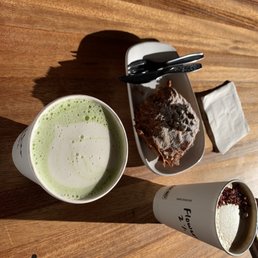 Pistachio chocolate croissant and specialty drinks (Japanese grade match with oat milk and flower mocca). So good!