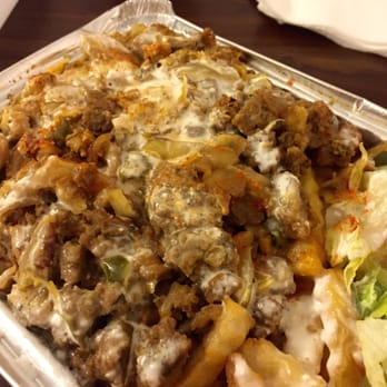 28th & Madison Halal Stand - Mixed Chicken and Lamb over rice: $7.00 - Food Trucks Near Me - New York, New York 28th & Madison Halal Stand - Mixed Chicken and Lamb over rice: $7.00 - Food Trucks Near Me - New York, New York