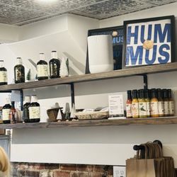 The Hummus Shop - They sell some sauces and hummus to go.
