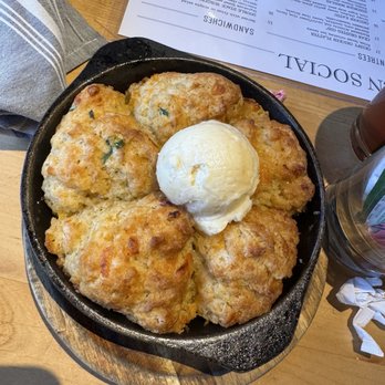 Kitchen Social - Cheddar biscuits we saw on some yelp pics and had to try. Melted  in your mouth and just the perfect mix of savory and sweet. - Cocktail Bars Near Me - Columbus, Ohio