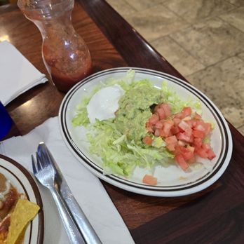 Don Julio's - A side plate with lettuce tomato sour cream and guacamole came with my enchiladas verde meal. - Bars Near Me - Fulton, Illinois Don Julio's - A side plate with lettuce tomato sour cream and guacamole came with my enchiladas verde meal. - Bars Near Me - Fulton, Illinois