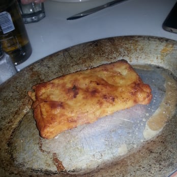 Poseidon - Flaming cheese! My sucky phone was too slow to get the fire! - Greek Near Me - Miami Beach, Florida Poseidon - Flaming cheese! My sucky phone was too slow to get the fire! - Greek Near Me - Miami Beach, Florida