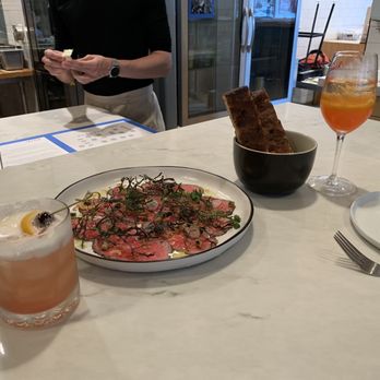 Birch - Beef carpaccio and focaccia with ricotta and snap peas. The cocktails were good but a little basic. - New American Near Me - Milwaukee, Wisconsin