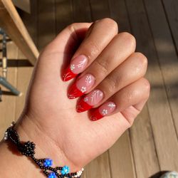 Luxury Nails - Anne did my nails and she did such a wonderful job they came out better than I expected. I love them!!