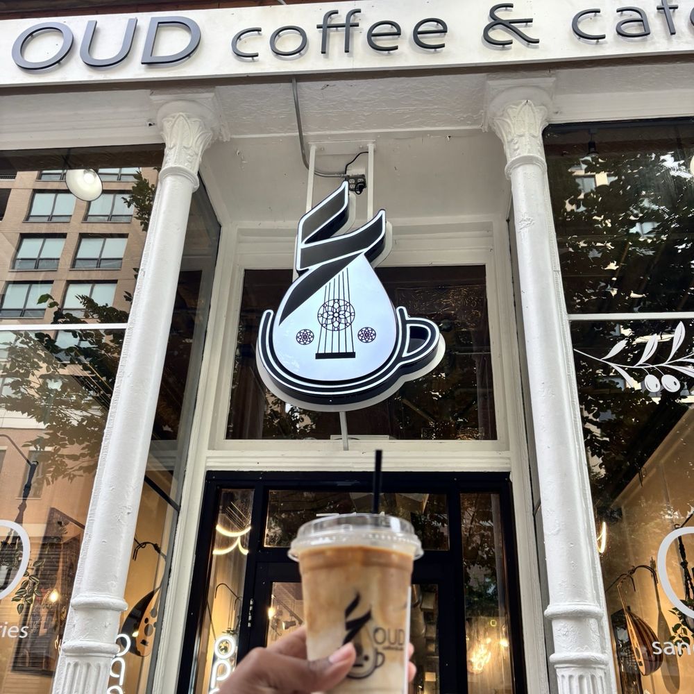 Oud Coffee & Cafe - Storefront and iced latte with almond milk - Coffee & Tea Near Me - Chicago, Illinois Oud Coffee & Cafe - Storefront and iced latte with almond milk - Coffee & Tea Near Me - Chicago, Illinois