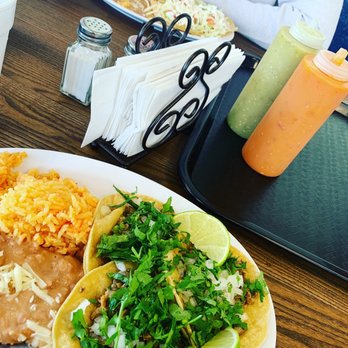 Tamales Los Girasoles - a plate of food on a table - Food Trucks Near Me - Malta, Illinois