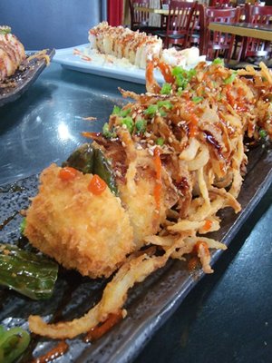 Mariscos y Sushi Los Tomateros by null