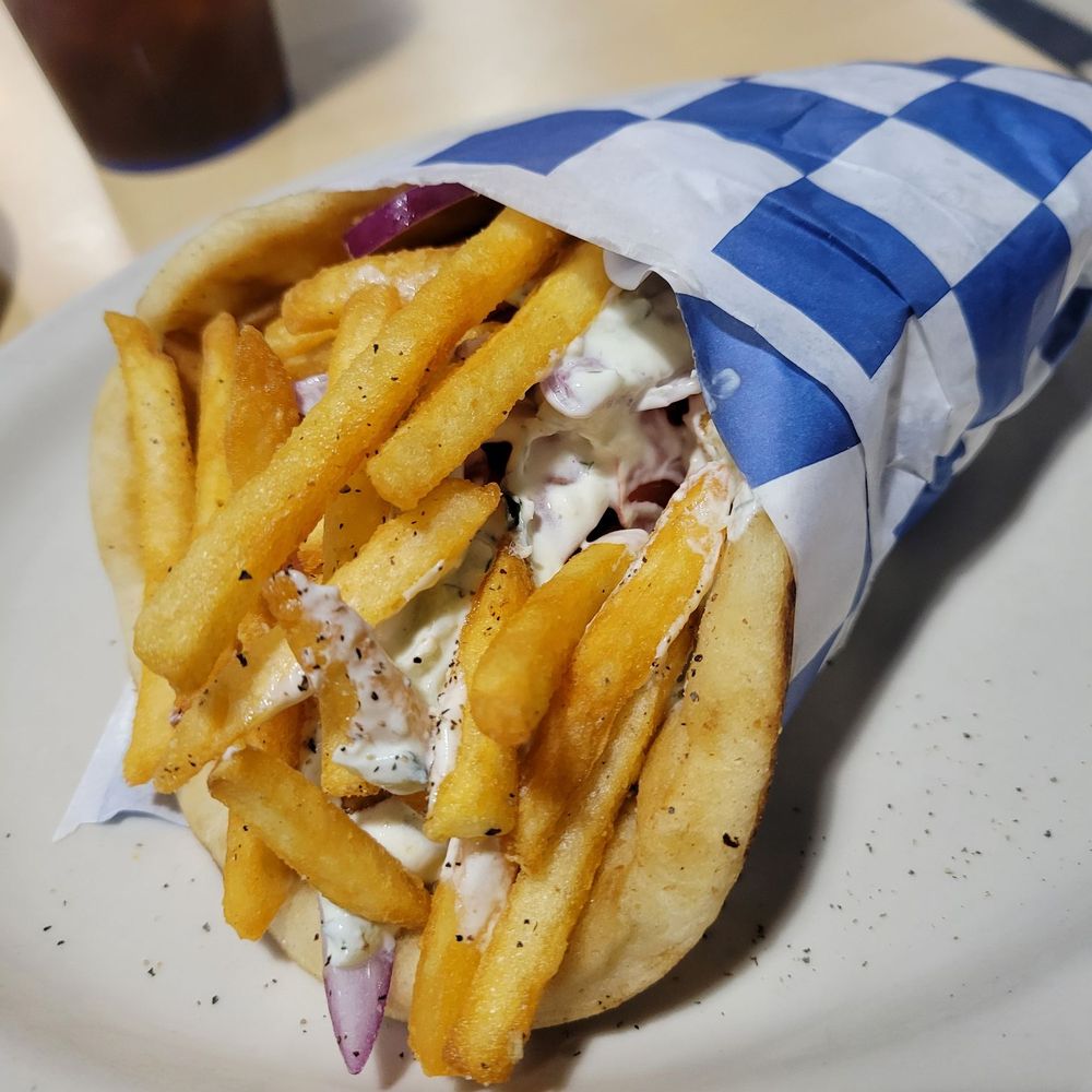 Hestia Fresh Grill - Chicken Gyro just like in Greece with extra crispy fries and homemade tzatziki. So delicious! - Greek Near Me - Largo, Florida Hestia Fresh Grill - Chicken Gyro just like in Greece with extra crispy fries and homemade tzatziki. So delicious! - Greek Near Me - Largo, Florida