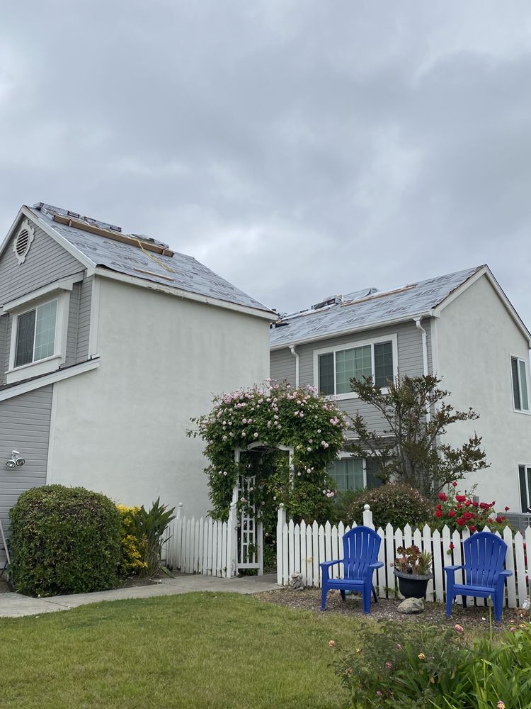 Slide of One Stop Roofing