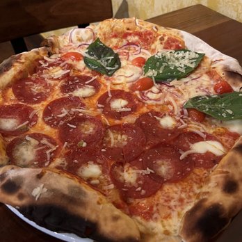 Pizzeria La Rocca - Half classic pepperoni half primavera - Pizza Near Me - Seattle, Washington Pizzeria La Rocca - Half classic pepperoni half primavera - Pizza Near Me - Seattle, Washington