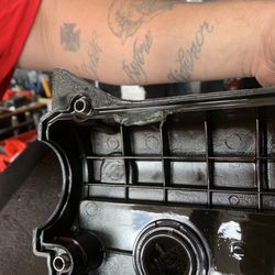 Shawnee Mission Kia - Valve cover where they used caulk to "fix" it
