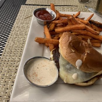 Chester's Kitchen and Bar - Half eaten cowboy burger and sweet potato fries. - New American Near Me - Rochester, Minnesota