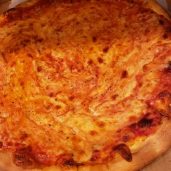 Picasso Pizza - Runny cheese that fell off the pizza and bottom is black and burnt