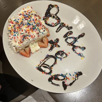 Black Walnut - CELEBRATION CAKE SLICE - New American Near Me - Houston, Texas