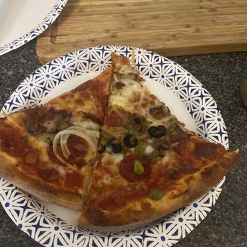 Capri Pizza & More - Two slices of the works pizza without the works. They fell short - Pizza Near Me - Zephyrhills, Florida