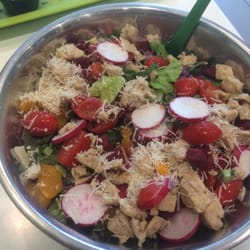 Custom salad with mandarins, tomatoes, beets, radishes, shredded parm, plain grilled chicken over romaine and kale. Yum!