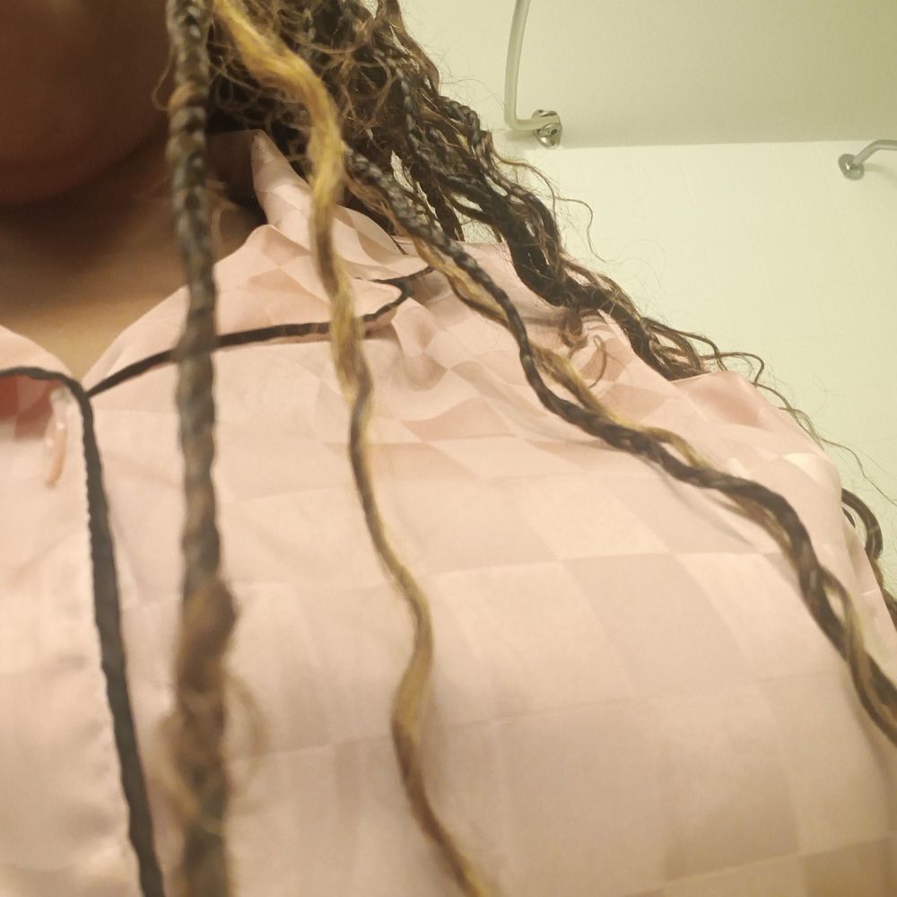 NLv African Hair Braiding Logo