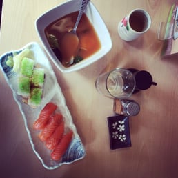 Kimchi soup, spicy tuna roll and salmon nigiri Kimchi soup, spicy tuna roll and salmon nigiri