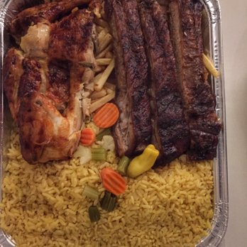 North Newark Barbeque - 1/2 chicken 1/2 pork rib combo with rice and French fries ($14) - Portuguese Near Me - Newark, New Jersey North Newark Barbeque - 1/2 chicken 1/2 pork rib combo with rice and French fries ($14) - Portuguese Near Me - Newark, New Jersey