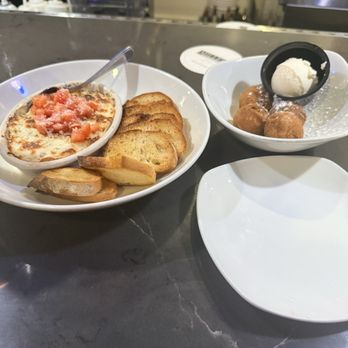 Miller's Seafood & Steakhouse - Hot Crab Dip comes with Basket of Hushpuppies - American Near Me - Kill Devil Hills, North Carolina
