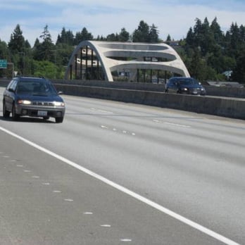 I-90 Floating Bridge - An obligatory picture of a Subaru wagon on the bridge and heading west on I-90. - Landmarks & Historical Buildings Near Me - Seattle, Washington