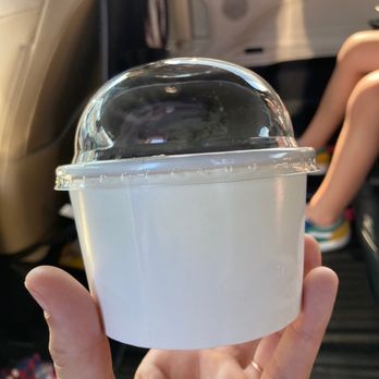Golly G's - a hand holding a container of ice cream - Coffee & Tea Near Me - Clarksville, Tennessee Golly G's - a hand holding a container of ice cream - Coffee & Tea Near Me - Clarksville, Tennessee