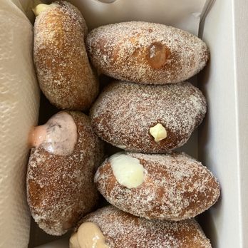 Penny's Waikiki Malasadas - The filling got so hot, it was basically liquid - Donuts Near Me - Honolulu, Hawaii Penny's Waikiki Malasadas - The filling got so hot, it was basically liquid - Donuts Near Me - Honolulu, Hawaii