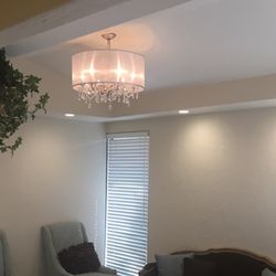 Dellacqua Rene, DDS - I love the chandeliers! Calming environment.