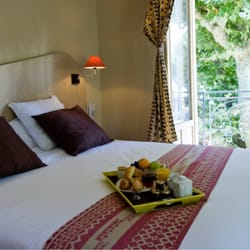 Inter-hotel L'Iroko Grand Port - L'une de nos chambres avec porte-fenêtre et balcon